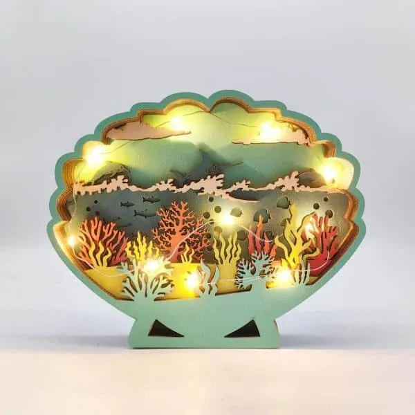 Wooden Carved Shell Craft – Layered Ocean Scene with Dolphins and Coral Reef - Image 2