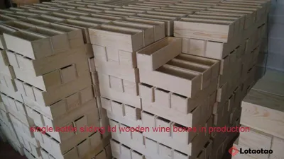 Single bottle sliding lid wooden wine boxes in production on the assembly bench