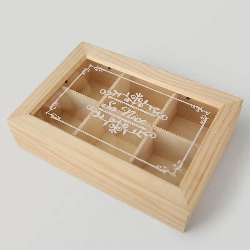 Close-up of a closed pine 6 compartment wooden storage box on white backdrop