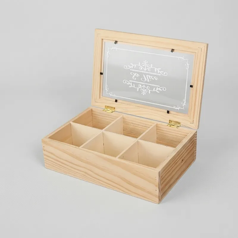 Closed 6 compartment wooden storage box filled with tea bags and small items