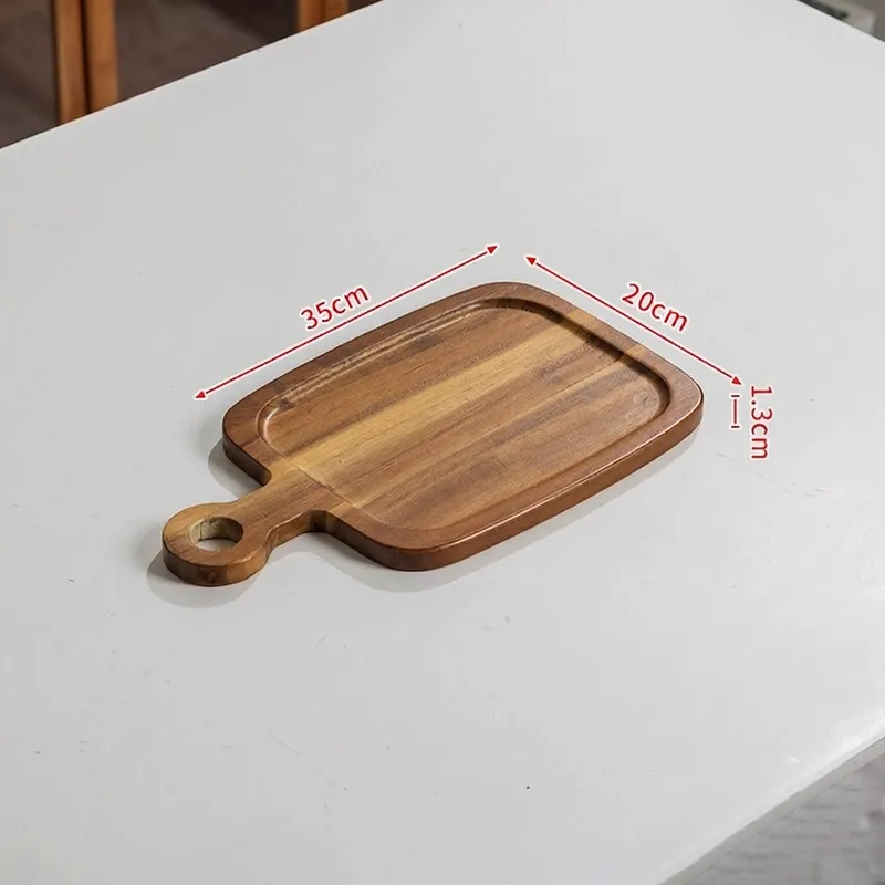 Recessed acacia wood serving tray measuring thirty-five by twenty centimeters