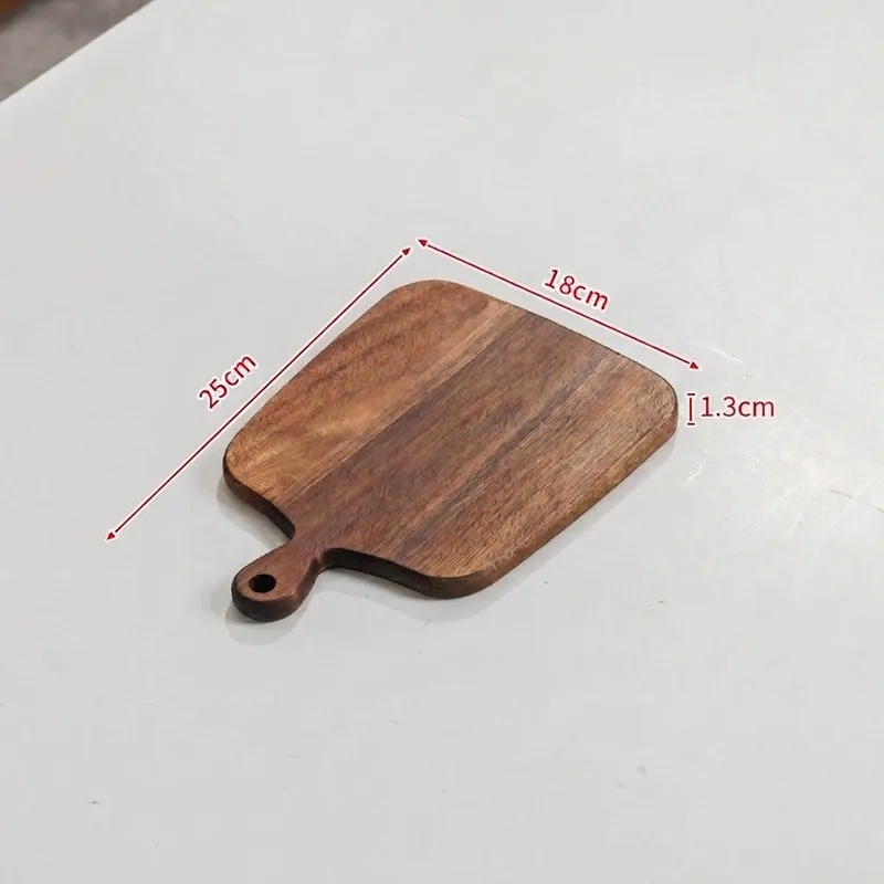 Small rectangular wood board measuring twenty-five by eighteen centimeters with handle