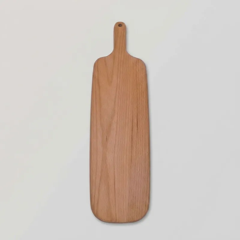 Elongated beech wood serving board with a short rounded handle