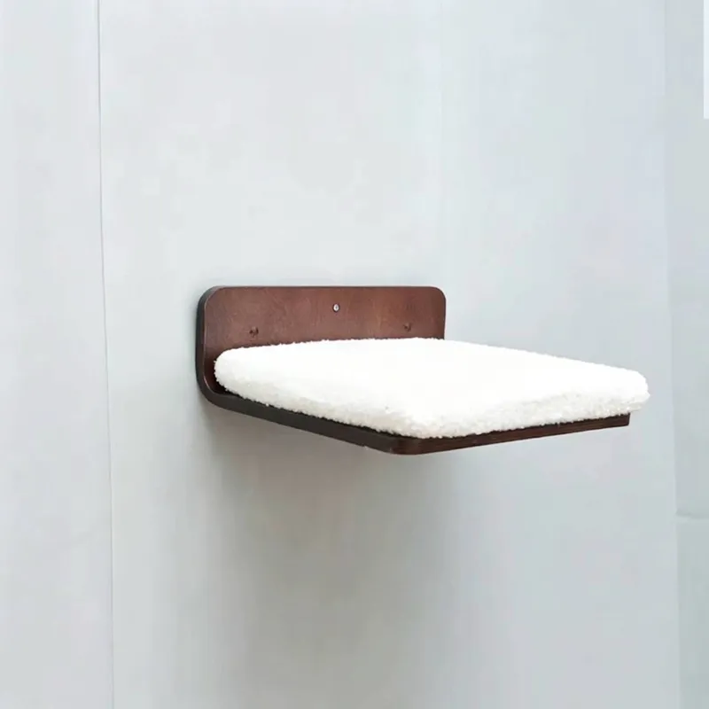 Rectangular walnut wooden cat step with white fleece cushion on wall