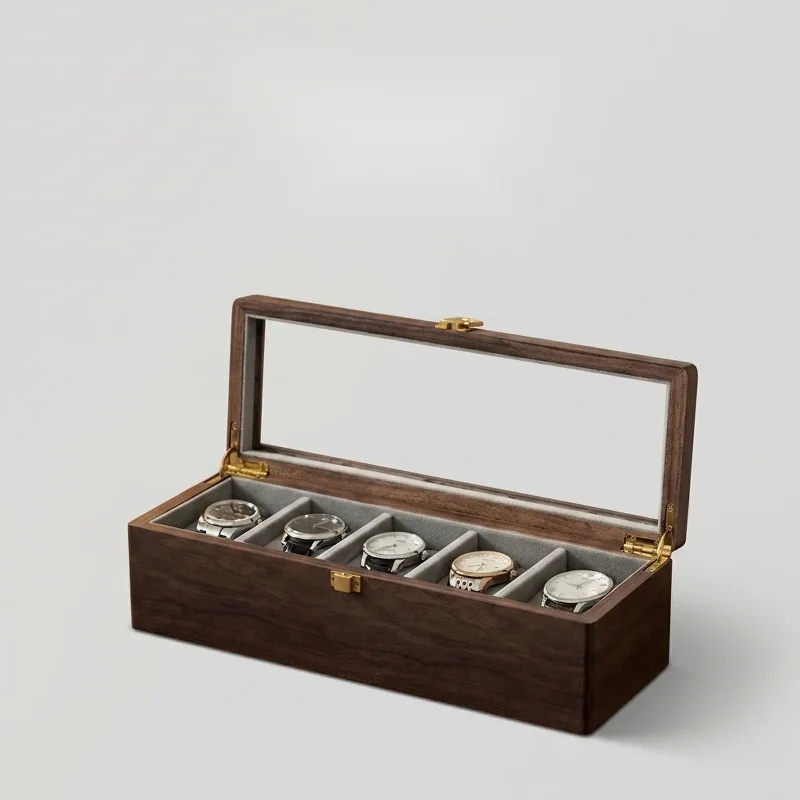 Open walnut wood watch storage box showing velvet lined slots and hinges