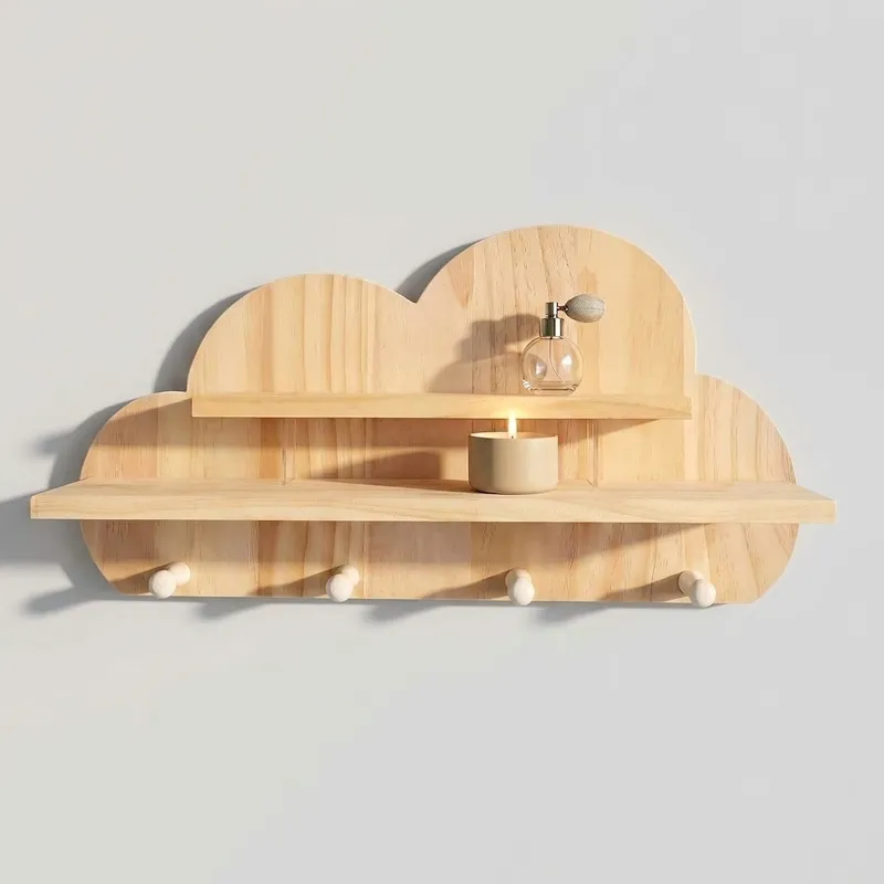 Wooden cloud wall shelf with candle and perfume bottle on wall